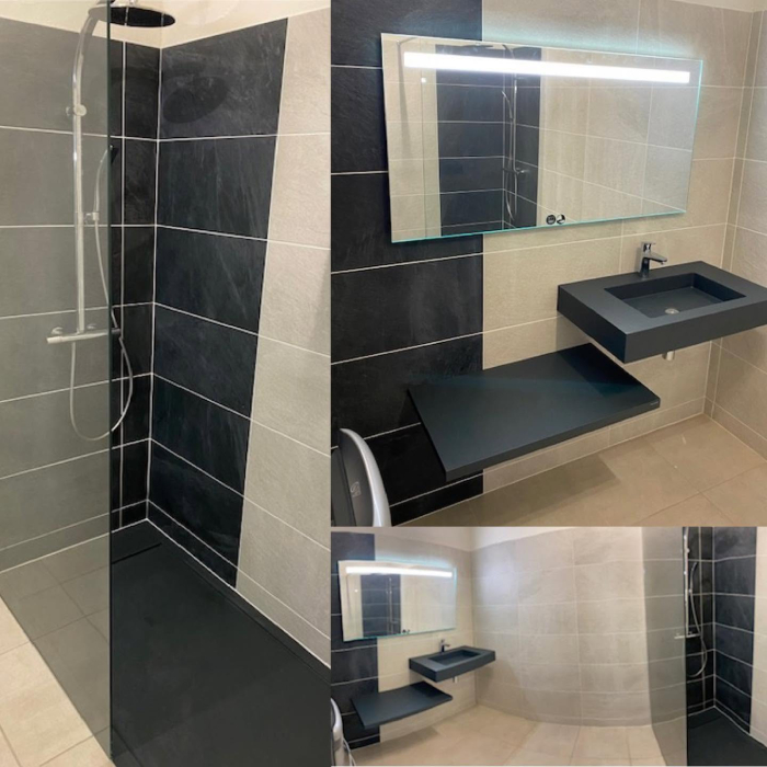 Salle de bains moderne rénovée avec douche, lavabo et équipements sanitaires par Société Escaffit